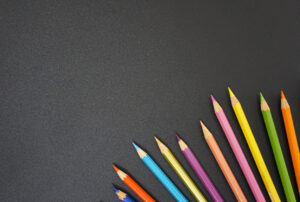 Coloured pencil on black paper
